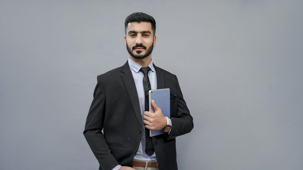 a man holding a book